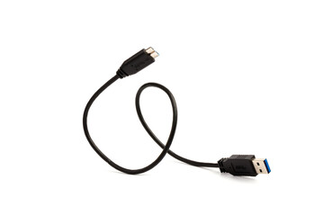 USB cable close up on white background. Charge, plugging, equipment and electricity