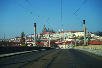 Prague historic castle view from empty bridge across Vltava River