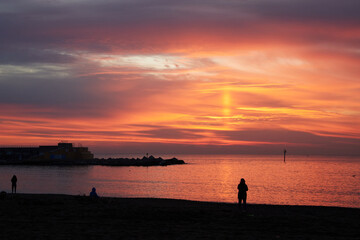 Fototapeta premium Barceloneta beach at sunrise in Barcelona, Spain