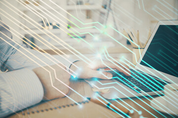 Businessman working on Laptop with technology theme drawing. Concept of big data. Double exposure.