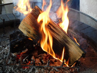A burning log producing heat in winter