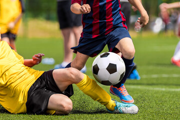 Soccer football tackle moment. Skill of tackling in soccer game. Two footballers in a duel. Running...