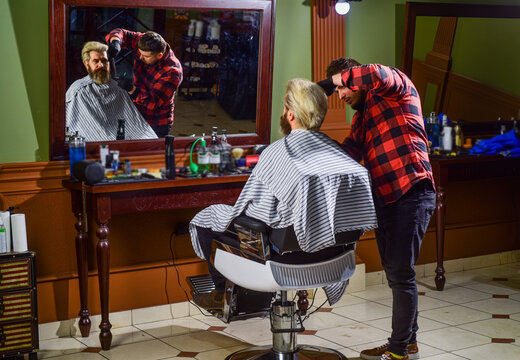 his perfect style. man want new hairstyle. male beauty and fashion. mature man at barbershop. brutal bearded man at hairdresser. barber with male client. hipster with dyed beard and moustache