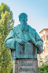 Monument for Johann Gutenberg, German inventor who developed mechanical type printing press to print books in historical and shopping downtown in Magdeburg, Germany, early Autumn.