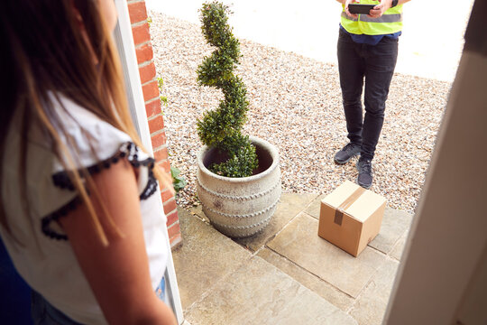 Boxes On Doorstep Of House High-Res Stock Photo - Getty Images