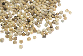 white peppers on the white background