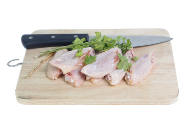Raw chicken  on cutting board on white background