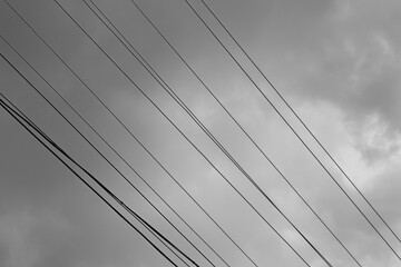 Fototapeta na wymiar Electrical wires. Black and white photo.