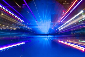 Fototapeta na wymiar motion blur of multicolor open air disco lights at the pool