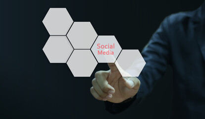 Businessman pointing his finger touch hexagon icon social media
