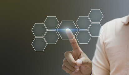 Businessman pointing his finger touch hexagon icon