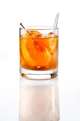 Old Fashioned  Cocktail in a glass with a slice of orange, cherry and ice isolated on white