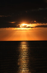 Sunrise from the sea, sun above the water