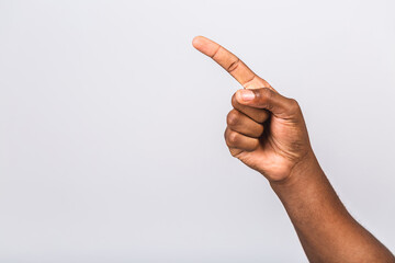 Black african american male hand point finger. Hand gestures - man pointing at virtual object with...