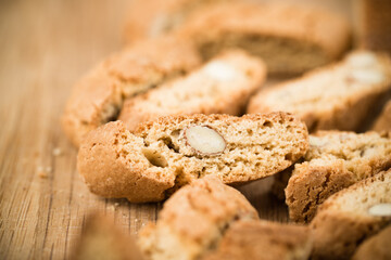 Top view of tasty Italian cantuccini on wooden table. Selective Focus.