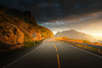 road by the sea in sunrise time, Lofoten island, Norway
