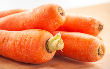 carrots close up on wooden board