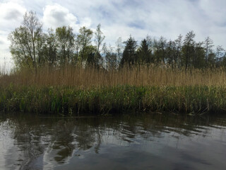 landscape with river and sky in the village of Giethoorn, Holland Netherlands