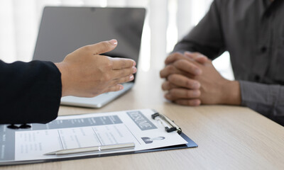 HR head welcomes the new employee who has successfully entered the job application and the entrance exam.