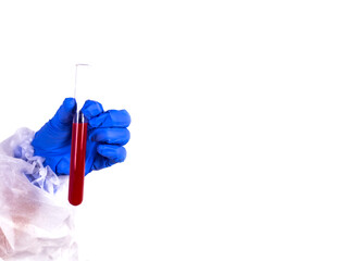 A hand with a blue glove holds a test tube with red liquid on a white background. Sample and blood in a test tube. Medicine concept. Isolated.