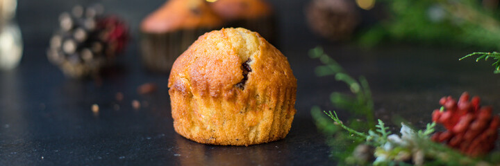 muffins cupcakes vanilla hocolate drops homemade baking cakes on the table christmas lights new year treat tasty top view copy space for text food background rustic