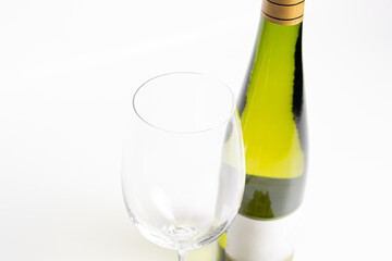 Bottle of white wine and glasses isolated on white