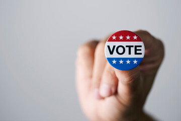 man with a vote badge for the US election