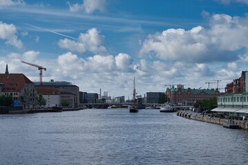 Fototapeta na wymiar Copenhagen, Europe, harbor skyline with ships and buildings