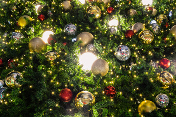 Obraz na płótnie Canvas Christmas tree background Decorated with beautiful lights