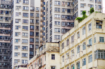 Residential area in old apartment with windows. High-rise building, skyscraper with windows of...