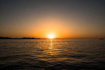 Fototapeta premium Colorful sunset at the Adriatic sea photographed in Zadar, Dalmatia, Croatia