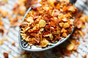 Dried hot chili peppers oriental spices close-up, macro