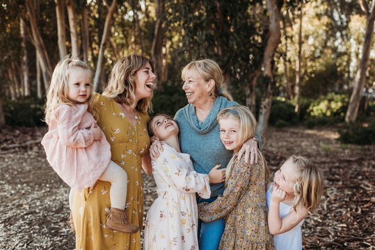Portrait of Multigenerational Family of Women Embracing Outside