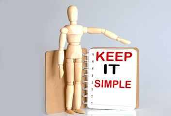 Wooden man shows with a hand to white easel with text ALWAYS KEEP SMILE on white background