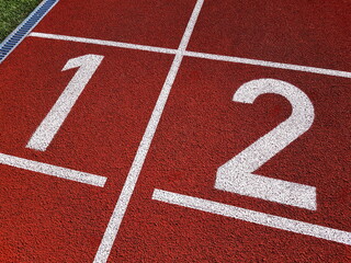 Red running racetrack on the stadium. Red running tracks in the stadium. Empty sport stadium....