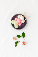 Japanese three colored dumplings Dango on plate, top view