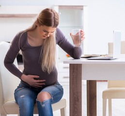 Pregnant woman at home getting ready for childbirth