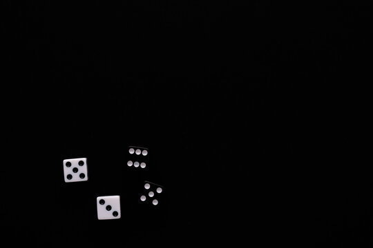 dice on a black background