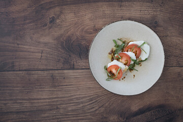 Caprese Salad on a Wooden Table