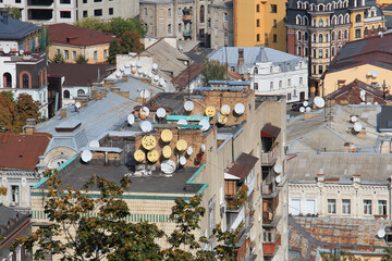 painted satellite antennas on the roofs of Kiev