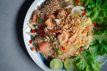 Spicy vermicelli salad with seafood, fresh vegetables.(Thai called Yum Woon Sen).