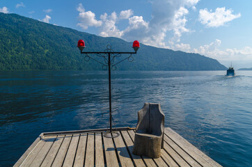 Pier on the shore of a mountain lake