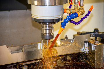 The CNC milling machine cutting the  mold parts by solid end mill tools. The mold and die...