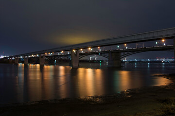 Fototapeta na wymiar The bridge in the Night city of Novosibirsk.