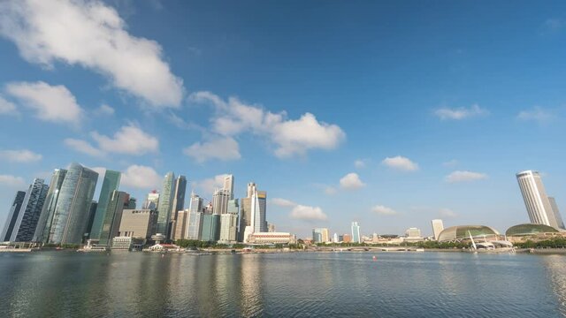 Singapore time lapse 4K, city skyline timelapse at Marina Bay waterfront business district