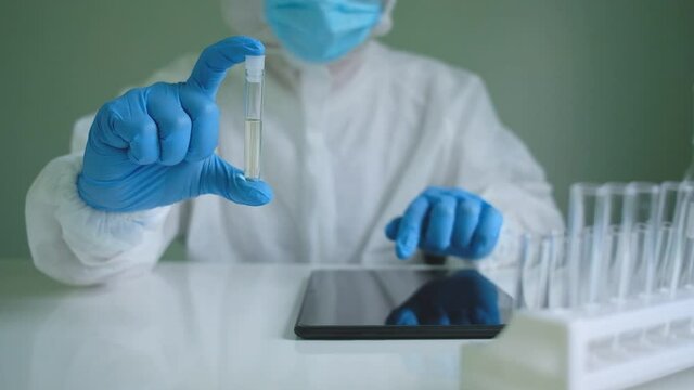 Scientists with scientific equipment are experimenting with anti-coronavirus drugs in a scientific research laboratory. DNA structure, innovative and technology.