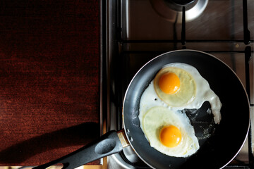 making english breakfast. cooking scrambled eggs.