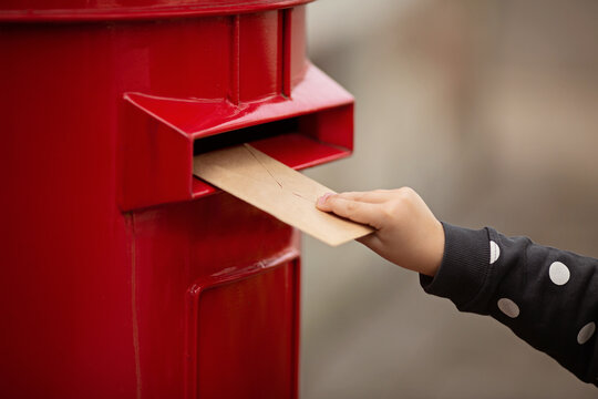 Hand holding envelope. Voting by Mail for absentee ballot or mail-in voting in the presidential election during coronavirus covid-19 pandemic