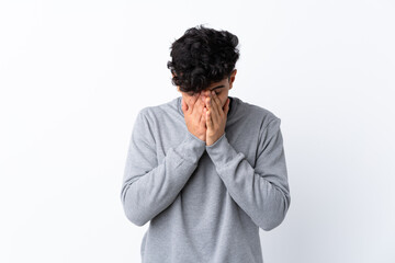 Young Argentinian man over isolated white background with tired and sick expression