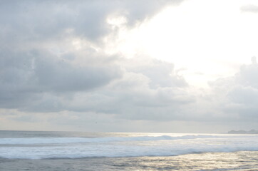 Naklejka na ściany i meble Sea long exsposure at sunset with cloudy sky. in the South Java Beach